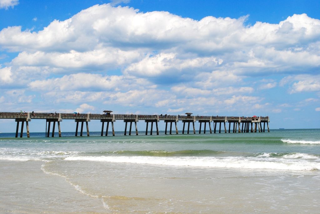 Jacksonville Beach Pier viewed from the south on a sunny day.